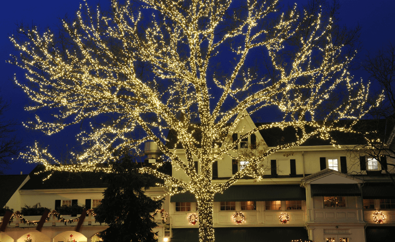 Permanent LED lighting on a Northeast Ohio home under lake-effect snow